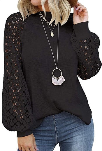 Model wears the top in black