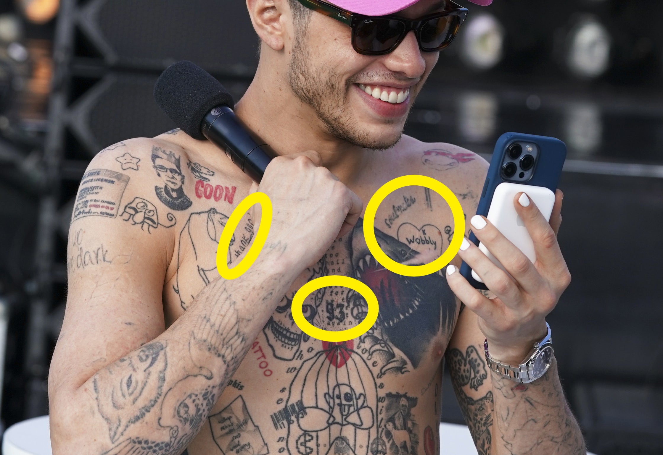 A closeup of the tattoos described