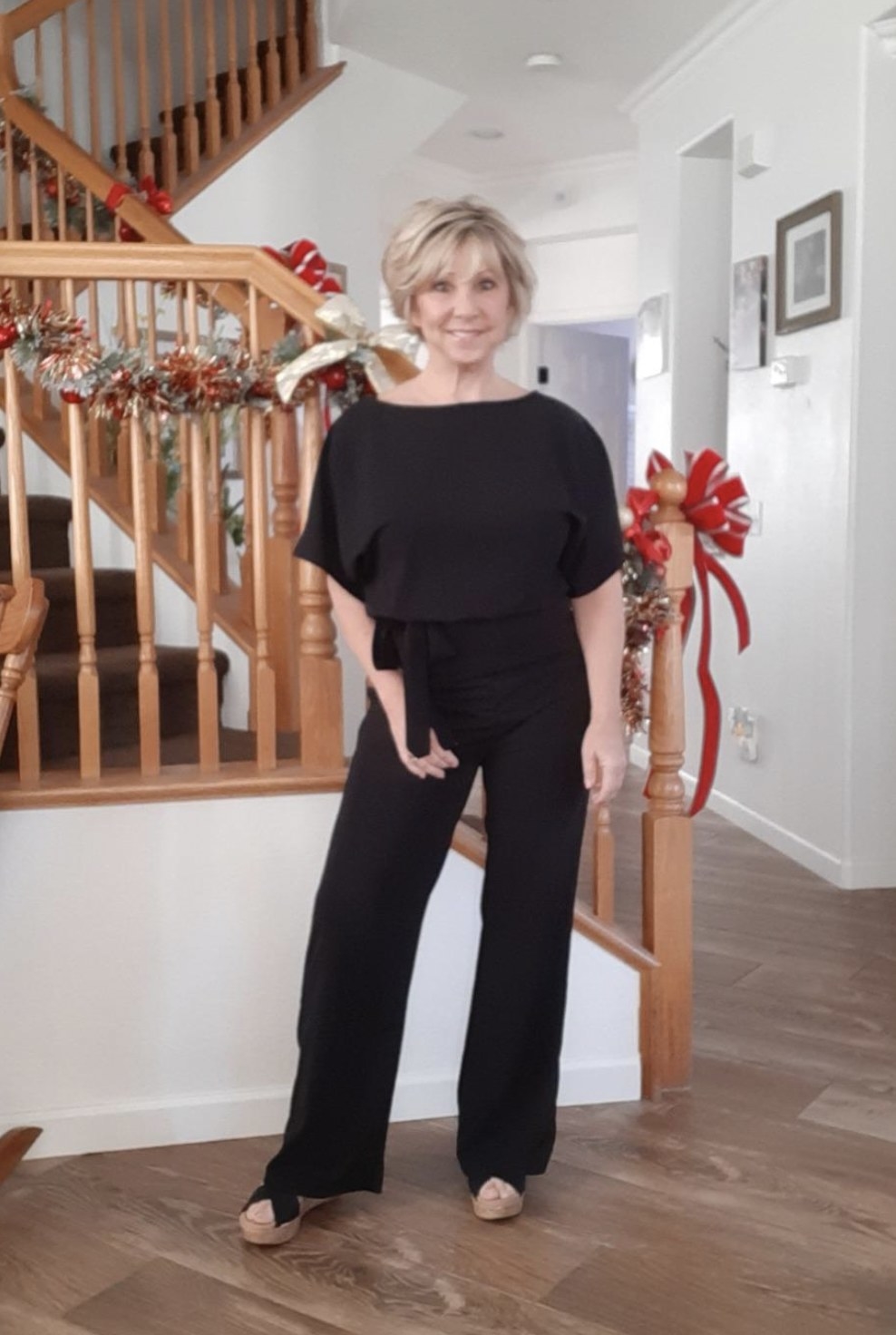 a reviewer wearing the jumpsuit in black