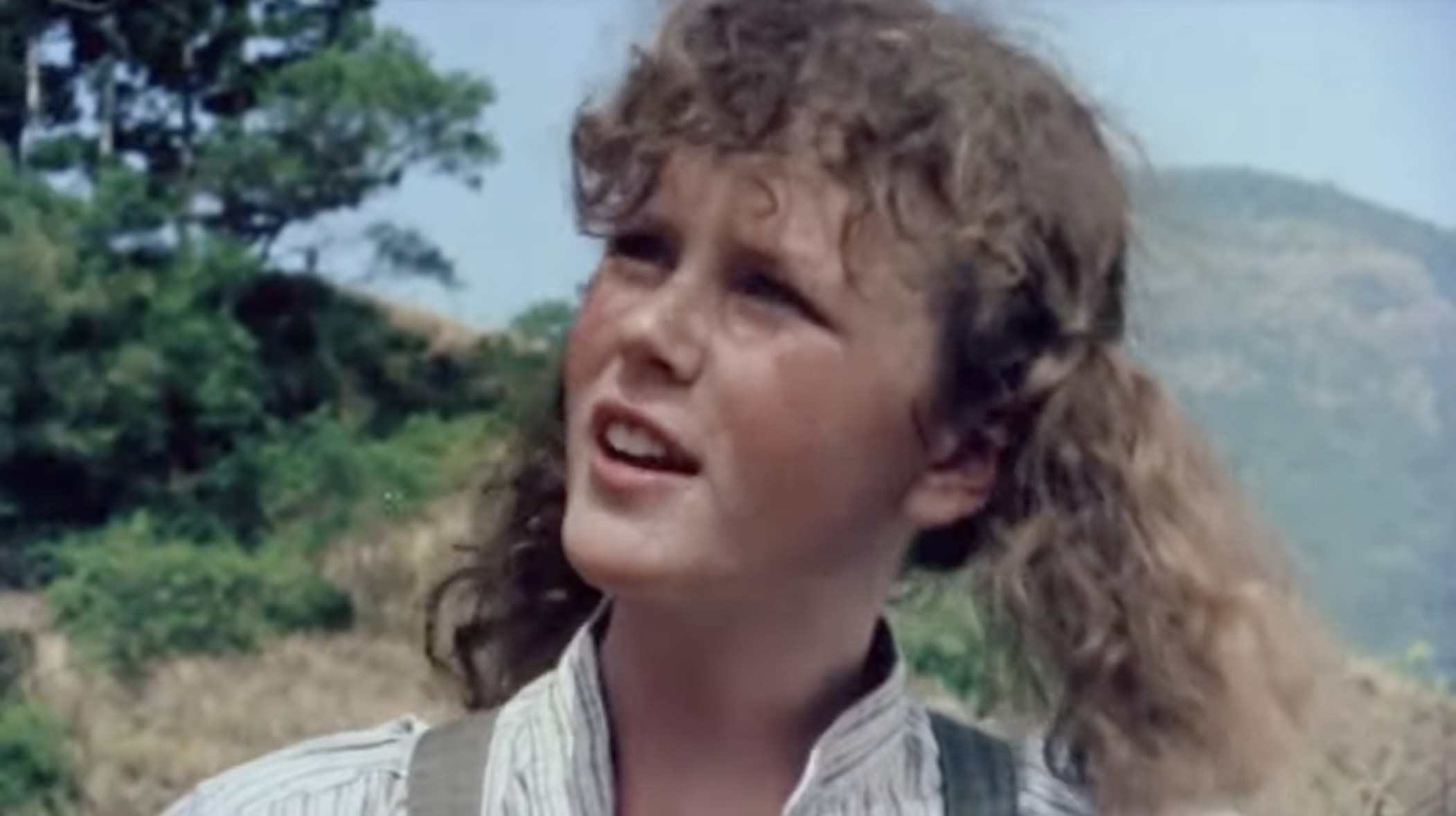 A young Nicole Kidman with her hair in pigtails