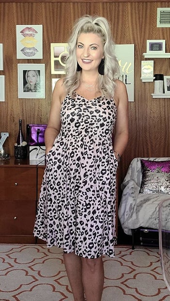 a person wearing the dress in a leopard print