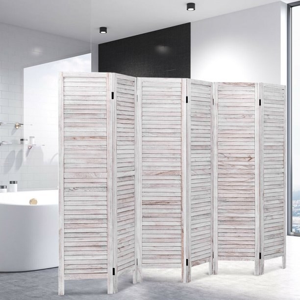 a whitewashed wooden room divider in a bathroom
