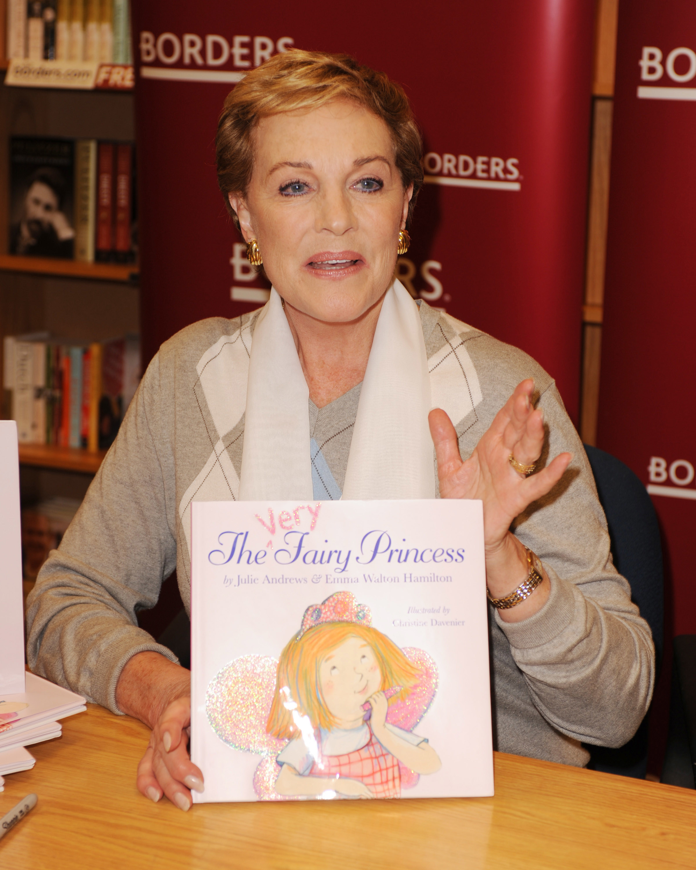 Julie Andrews holding a copy of &quot;The Very Fairy Princess&quot; at a book signing