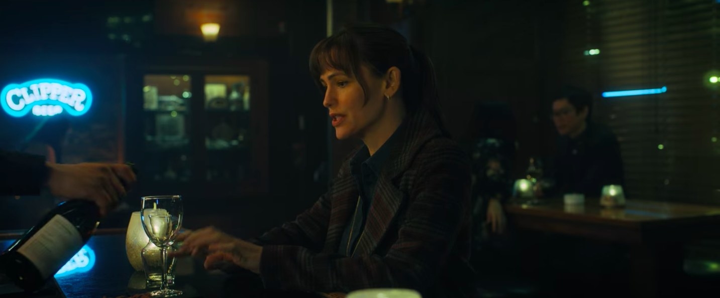 Ellie sitting at a bar in &quot;The Adam Project&quot;