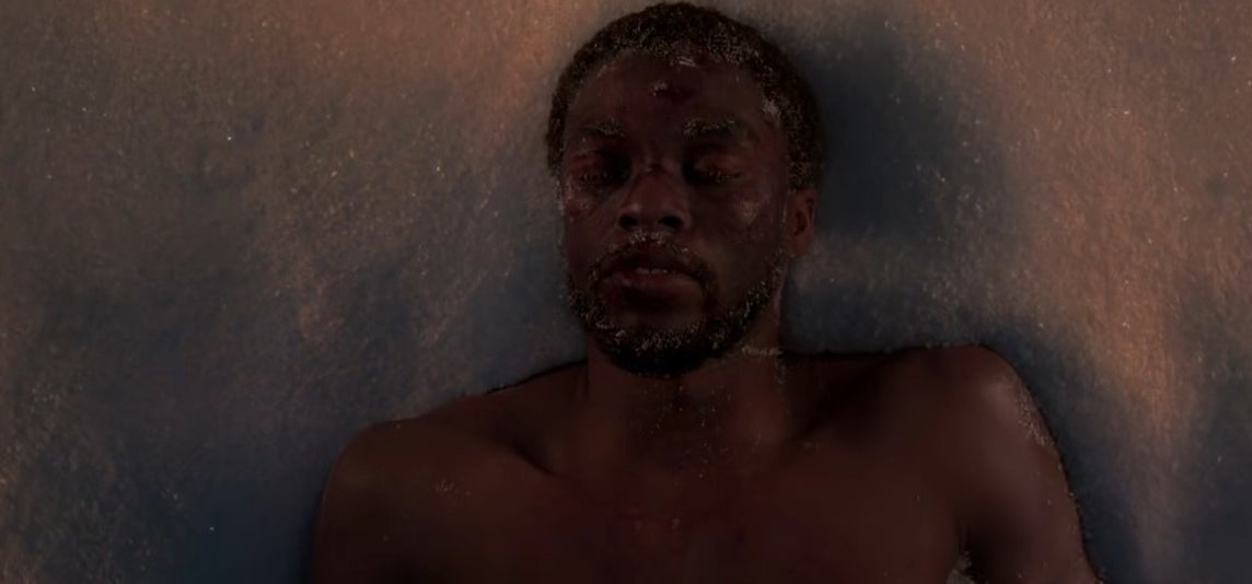 T&#x27;Challa lying unconscious in a pile of snow in &quot;Black Panther&quot;