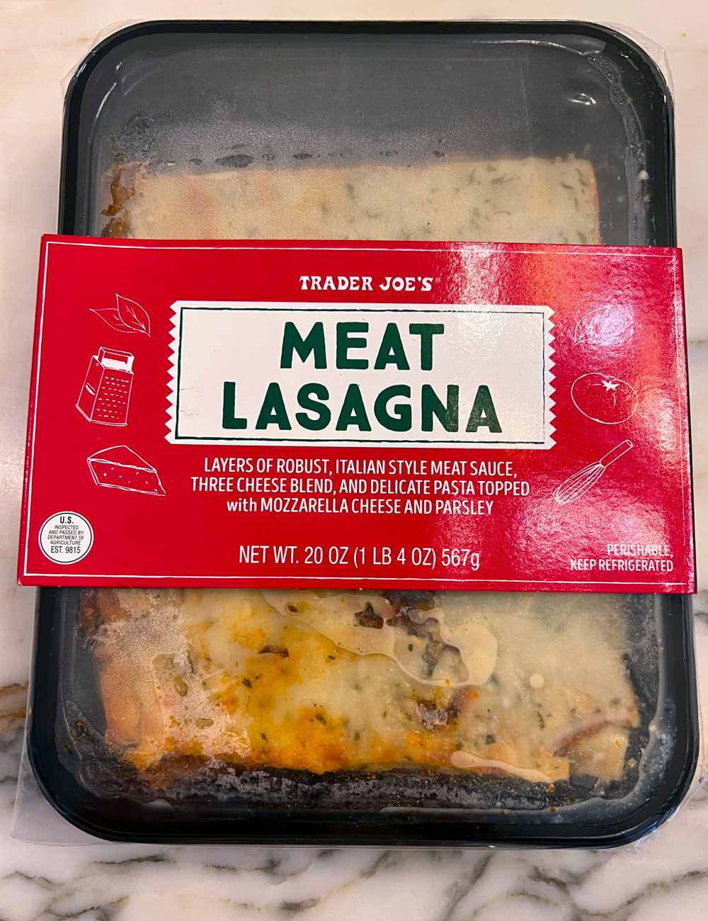 A container of Trader Joe&#x27;s meat lasagna