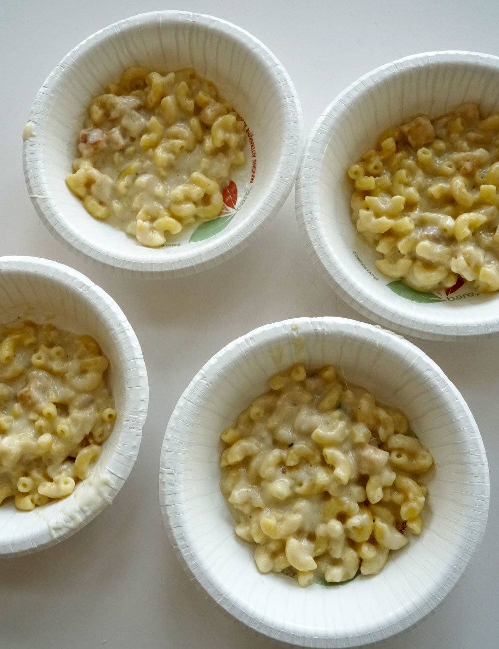 Four bowls of French onion macaroni and cheese