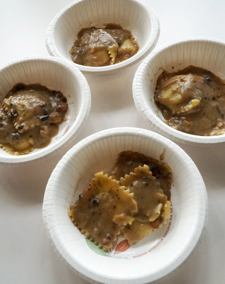Bowls of mushroom ravioli with mushroom truffle sauce