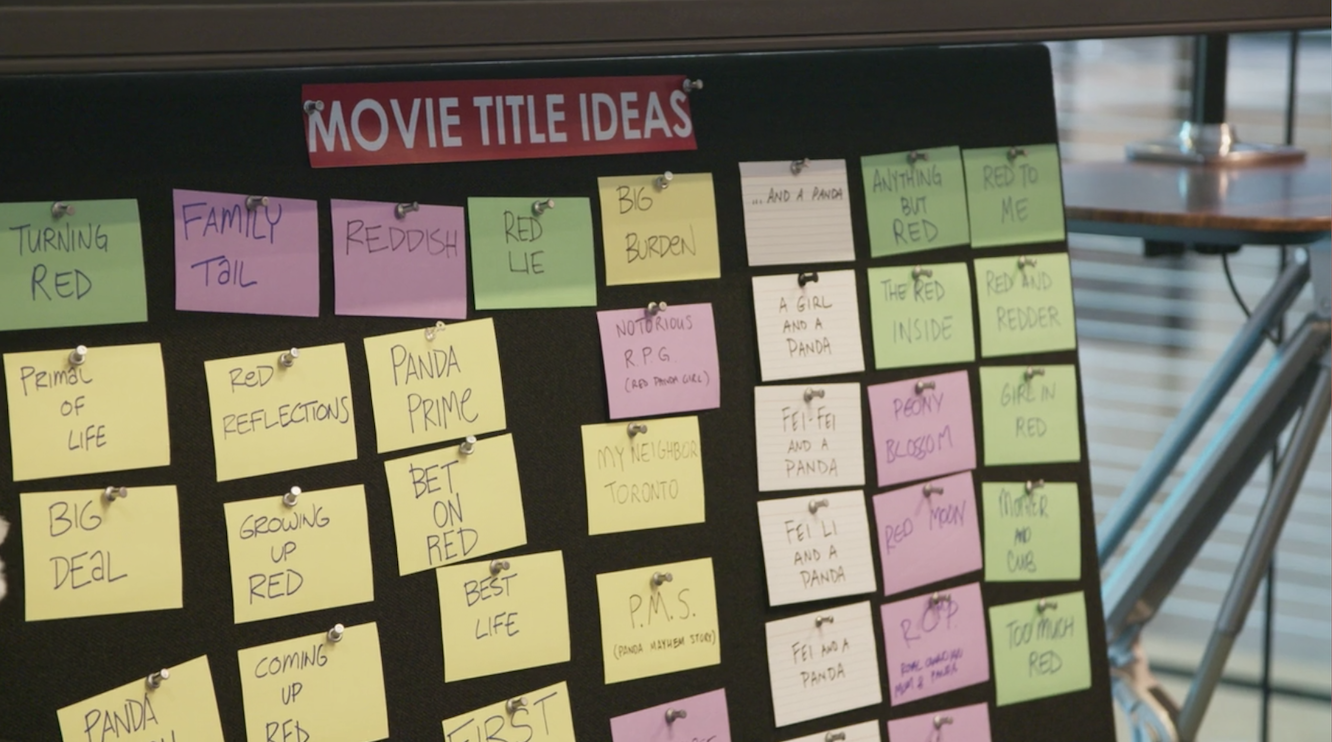 A board of index cards with movie titles on them