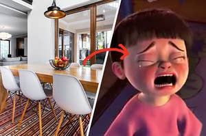 A dinning room table with a fruit bowl and Boo from "Monster's Inc." as she's crying