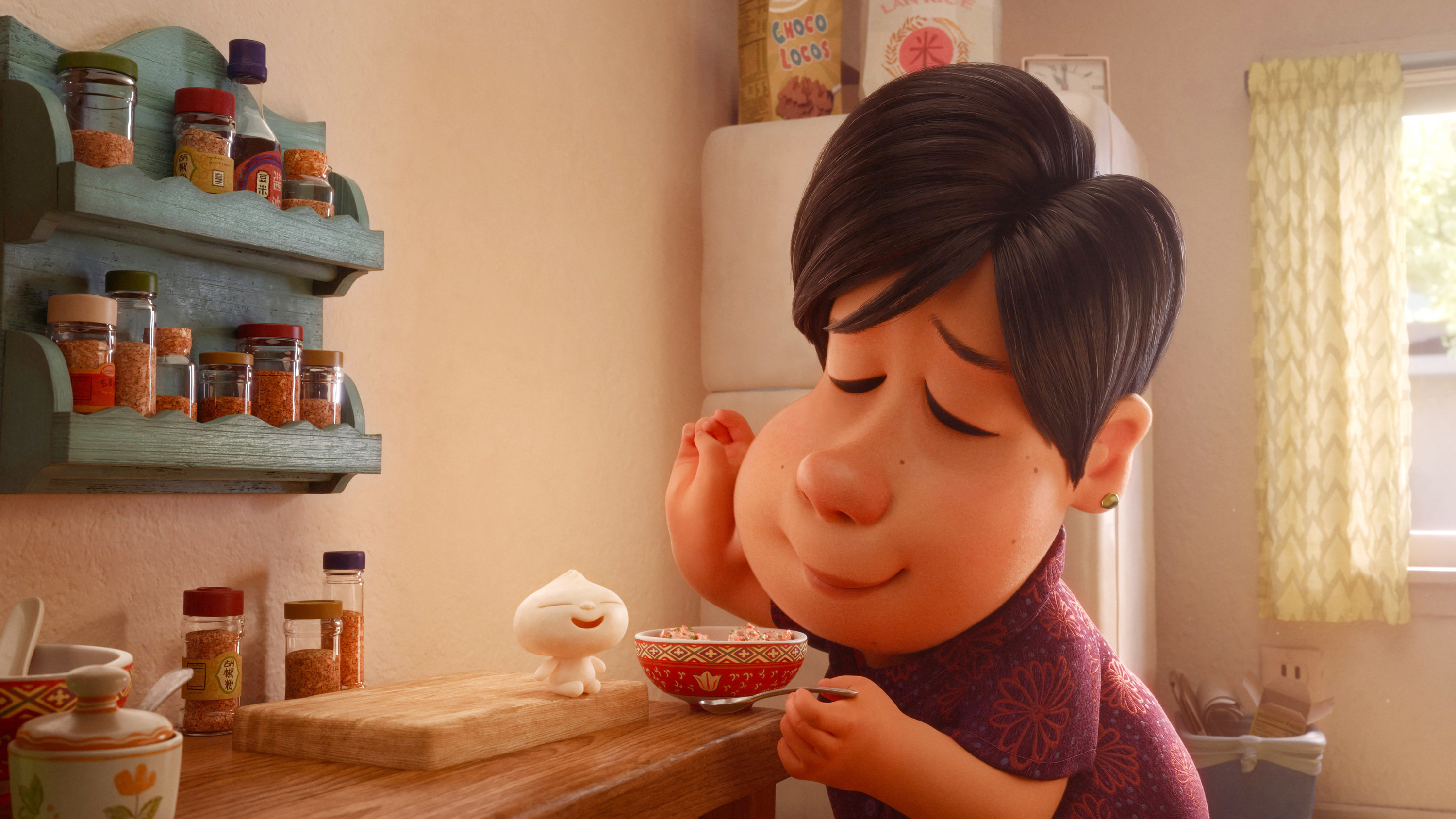 A still from Bao, of the mother cooking with the living dumpling