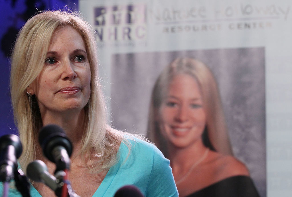 Beth Holloway fights back tears as she participates in the launch of the Natalee Holloway Resource Center