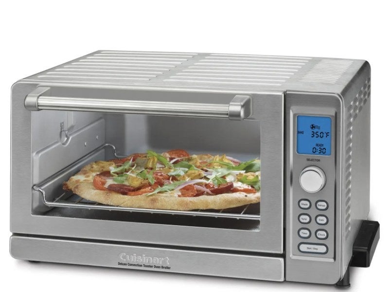 The toaster oven baking a personal pizza