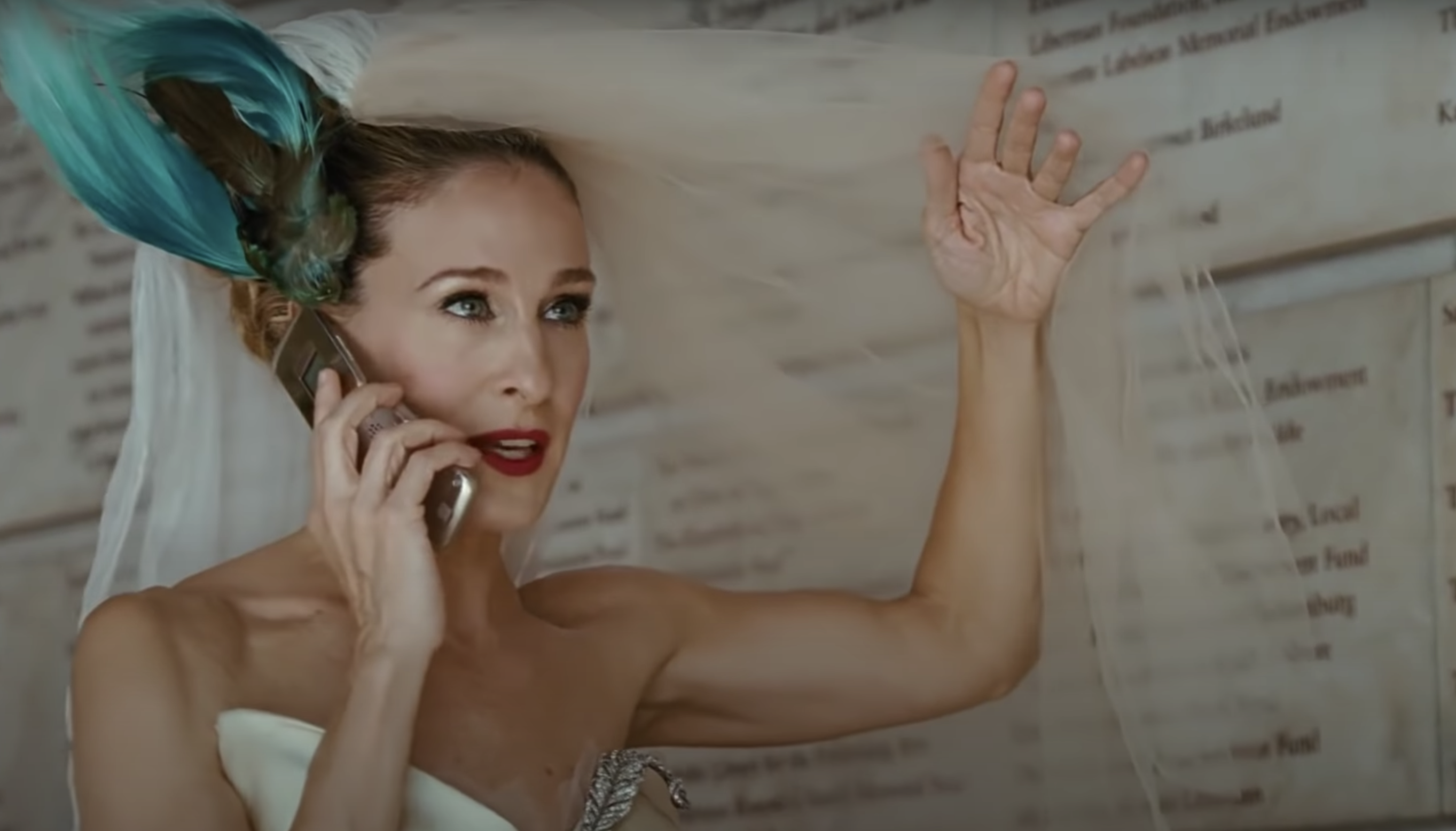 Carrie from &quot;Sex in the City&quot; in a wedding dress talking on the phone