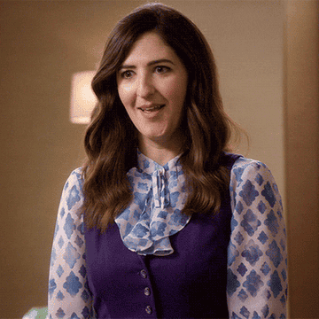 D&#x27;arcy Carden giving two thumbs up as Janet in The Good Place