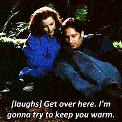 Scully and Mulder cuddle