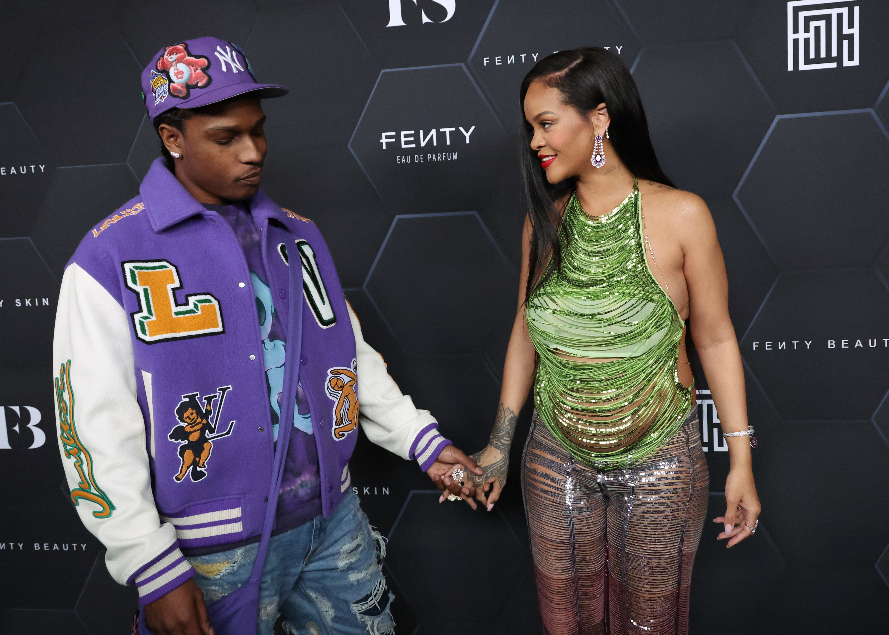 A$AP Rocky and Rihanna holding hands
