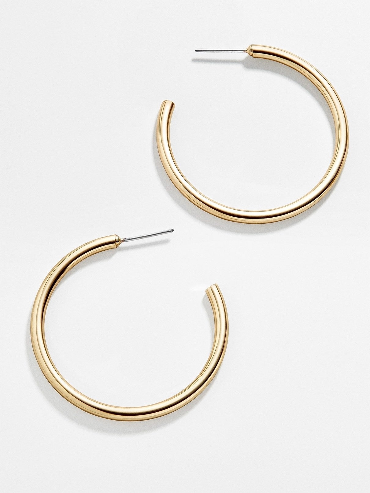 a pair of the big hoops laying on their side