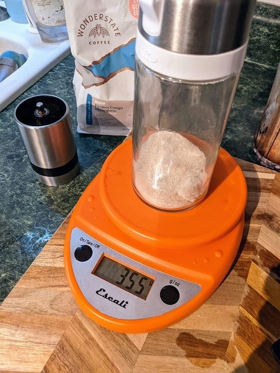 The scale in orange weighing flour
