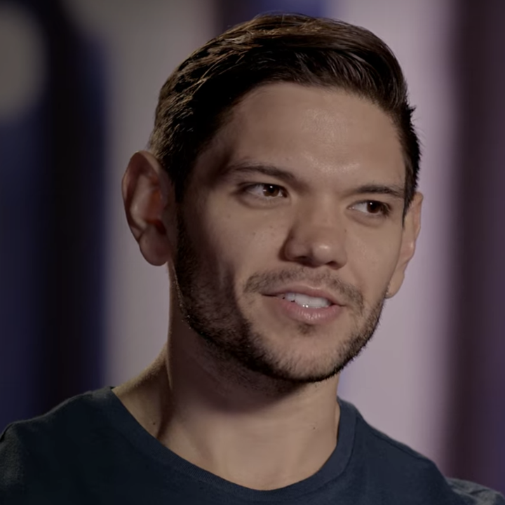 A closeup of Kyle speaking on Love Is Blind
