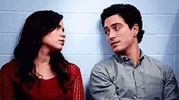 Amy and Jonah staring at each other deeply