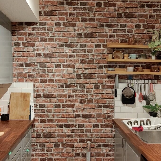 Brick wallpaper on kitchen wall