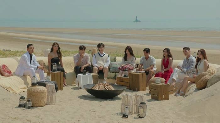 The cast of &quot;Single&#x27;s Inferno&quot; sits around the fire pit