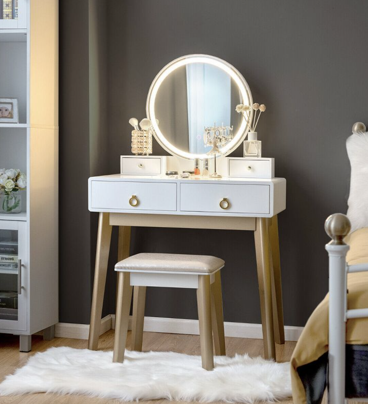 the white vanity table with a mirror and LED light in a bedroom