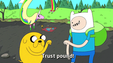 Gif from Adventure Time of Finn and Jake fist bumping as Finn says, &quot;trust pound&quot;