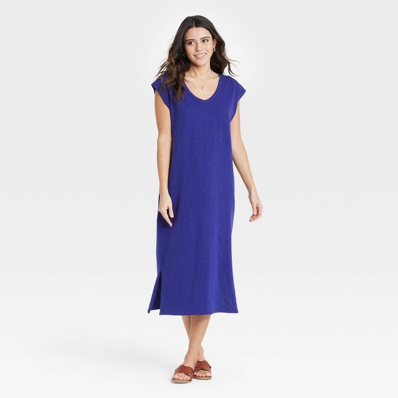 model wearing the dress in blue