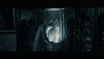 Dumbledore looking into the Pensieve