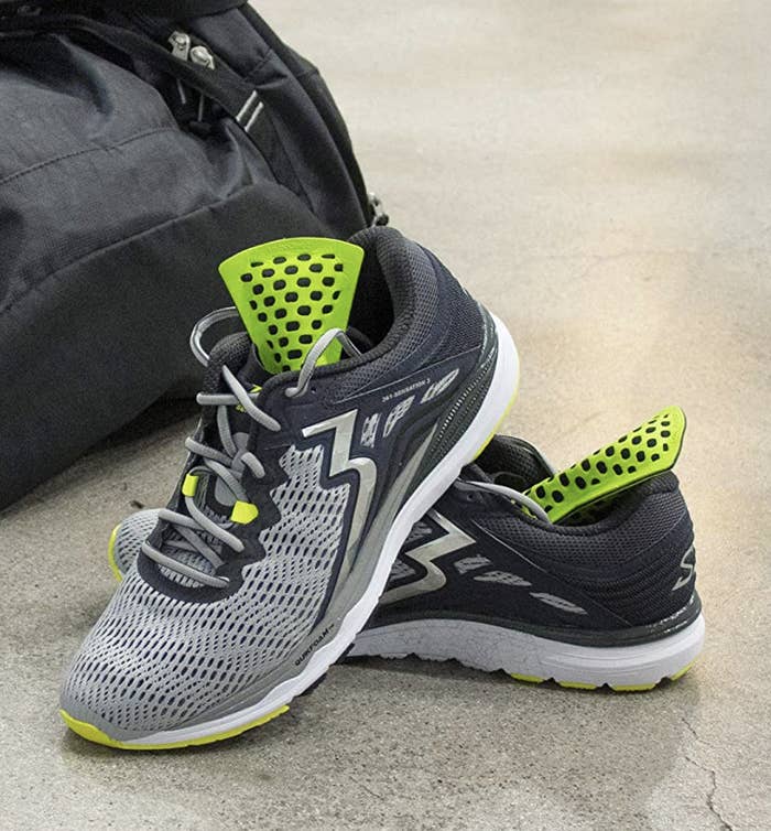 A pair of mesh running shoes with the de-odourizers in them