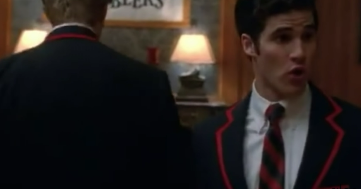 A close up of Blaine Anderson as he purses his lips