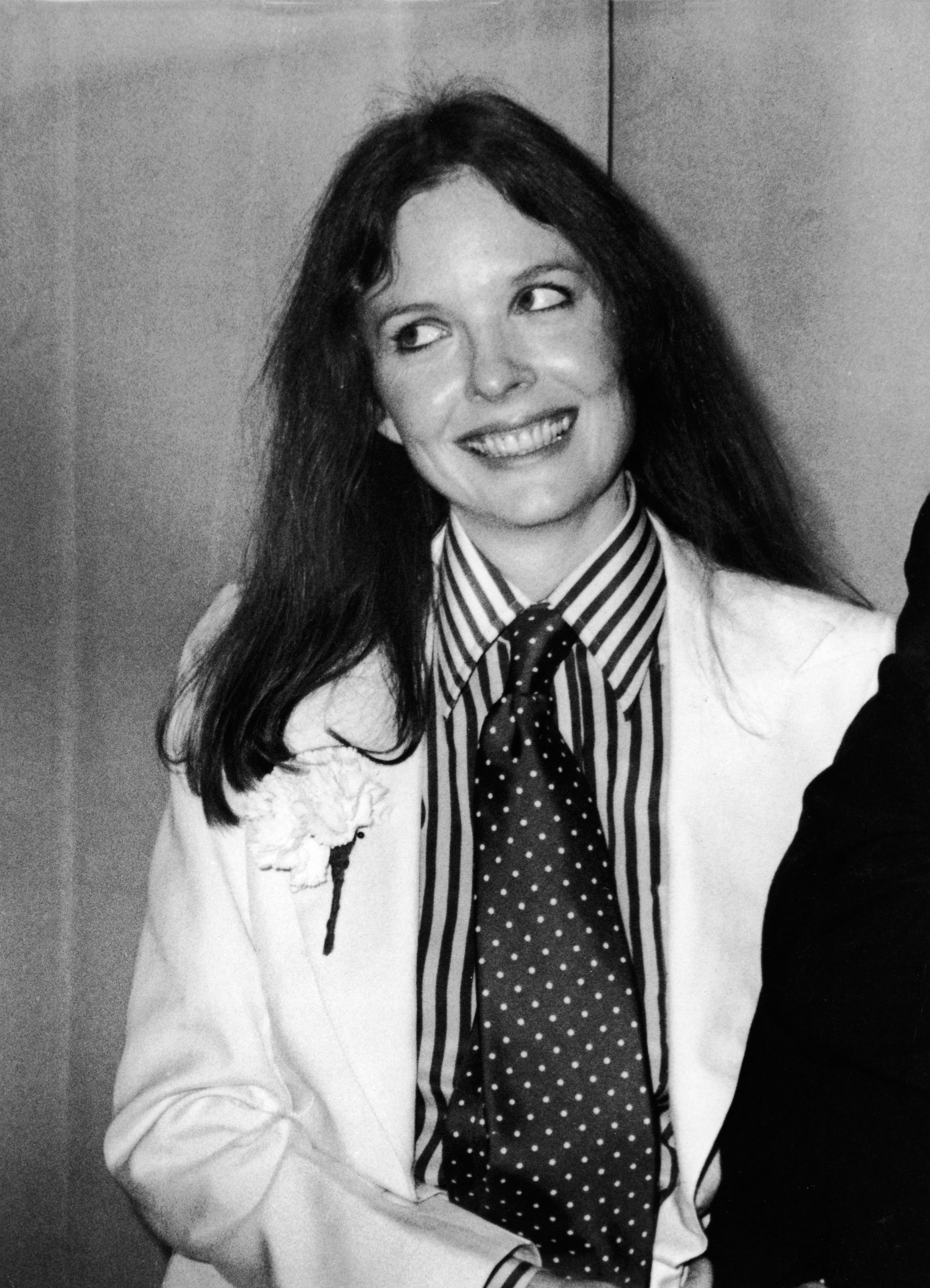 Keaton smiling at the 1976 Oscars