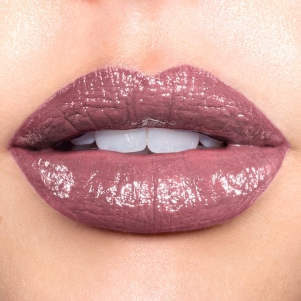Model wearing pink lipstick