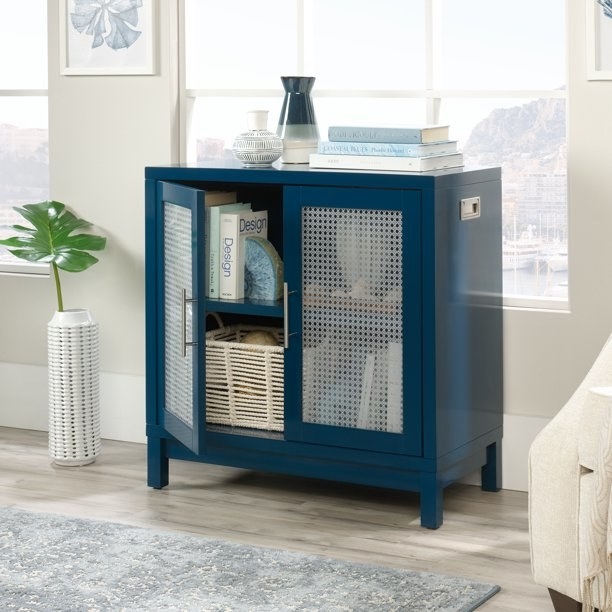 the navy accent storage cabinet with two doors
