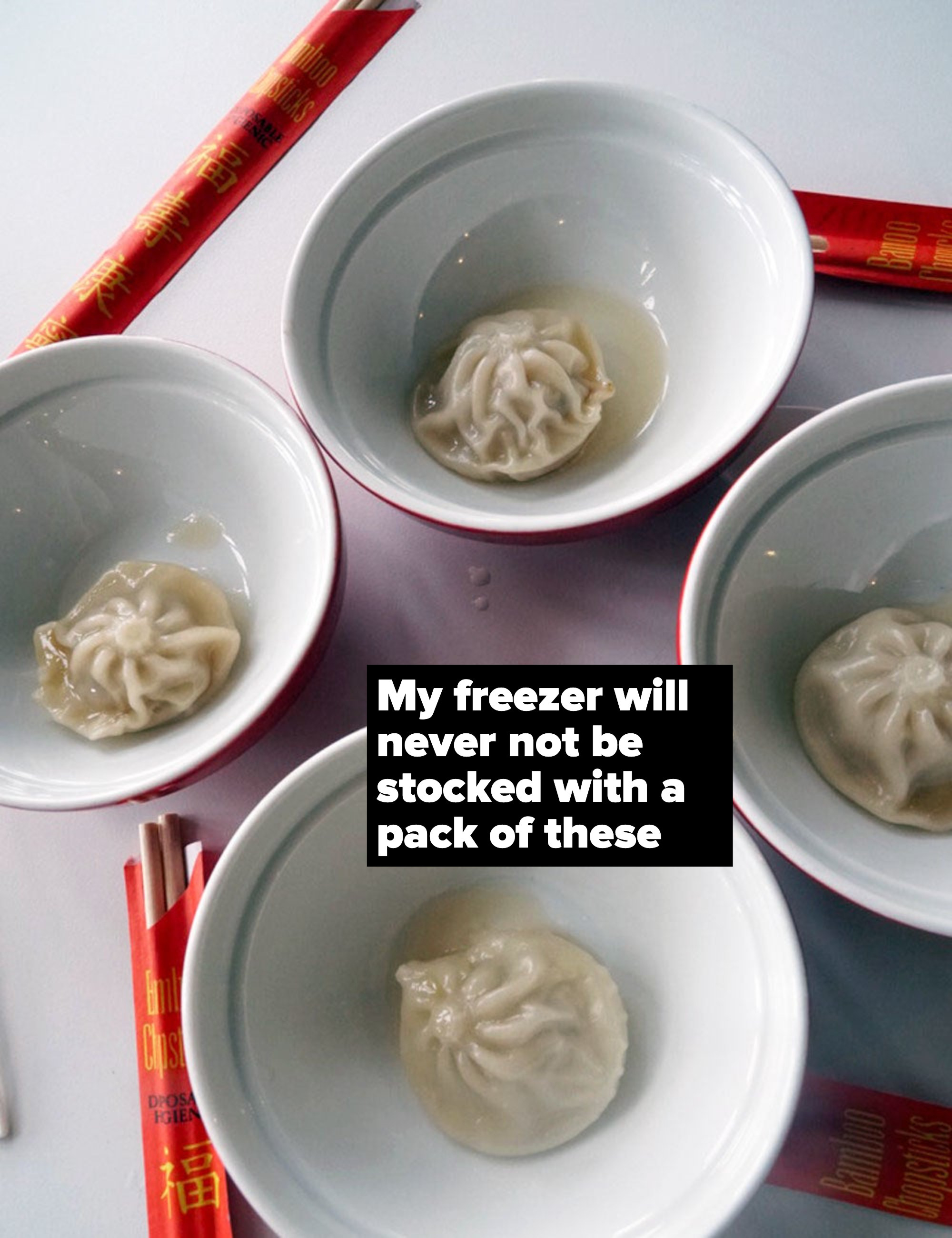 Four soup dumplings in little bowls