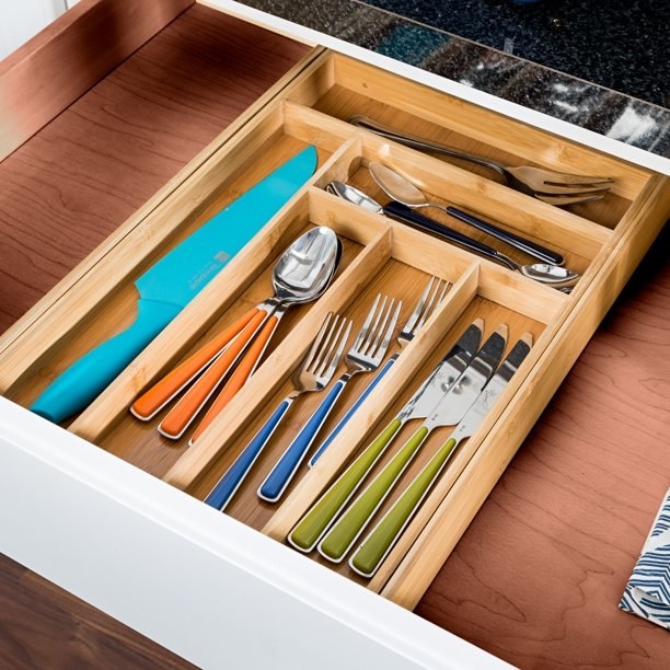 the organizer in a drawer filled with cutlery