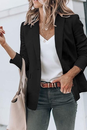 model wearing the blazer in black