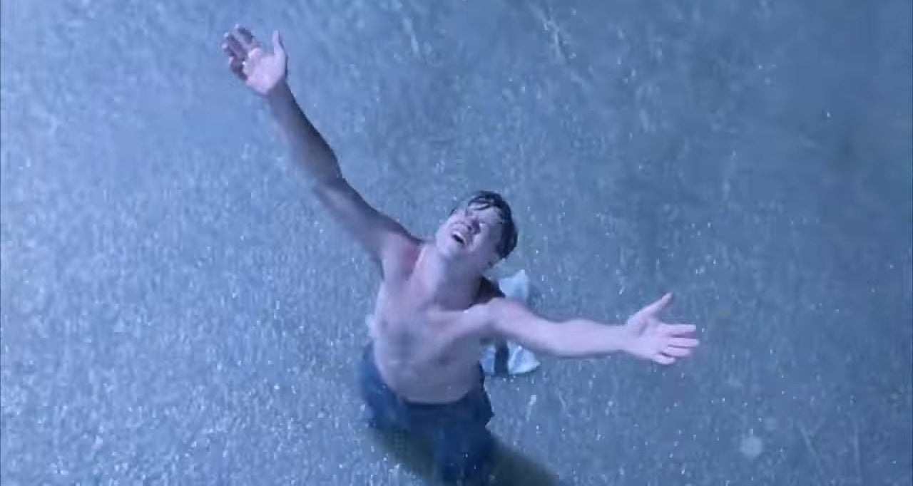 Andy standing in the rain with his shirt off in &quot;The Shawshank Redemption&quot;