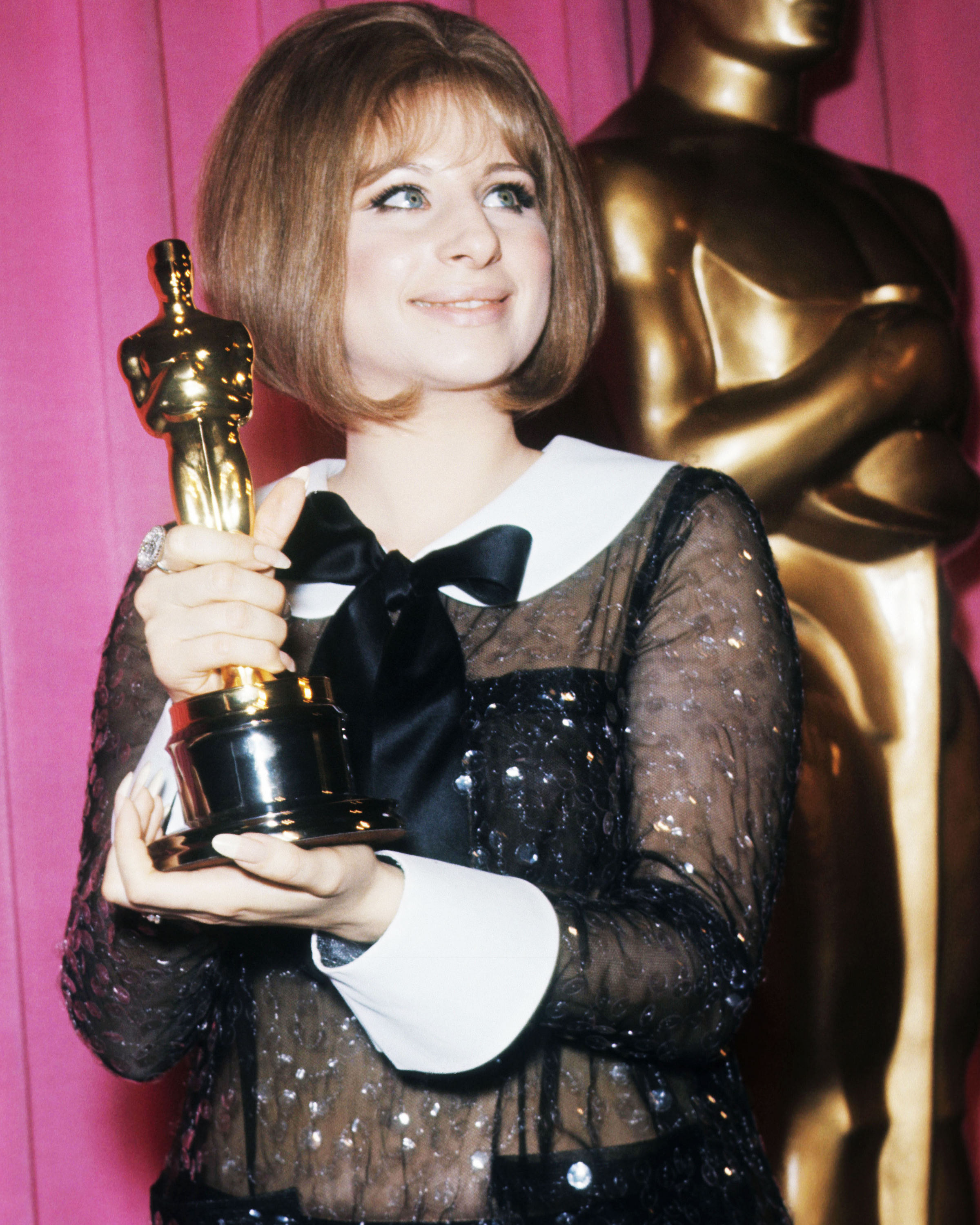 Barbra Streisand holds her Oscar for Best Actress won for the performance as Fanny Brice in the musical comedy-drama movie &quot;Funny Girl&quot;