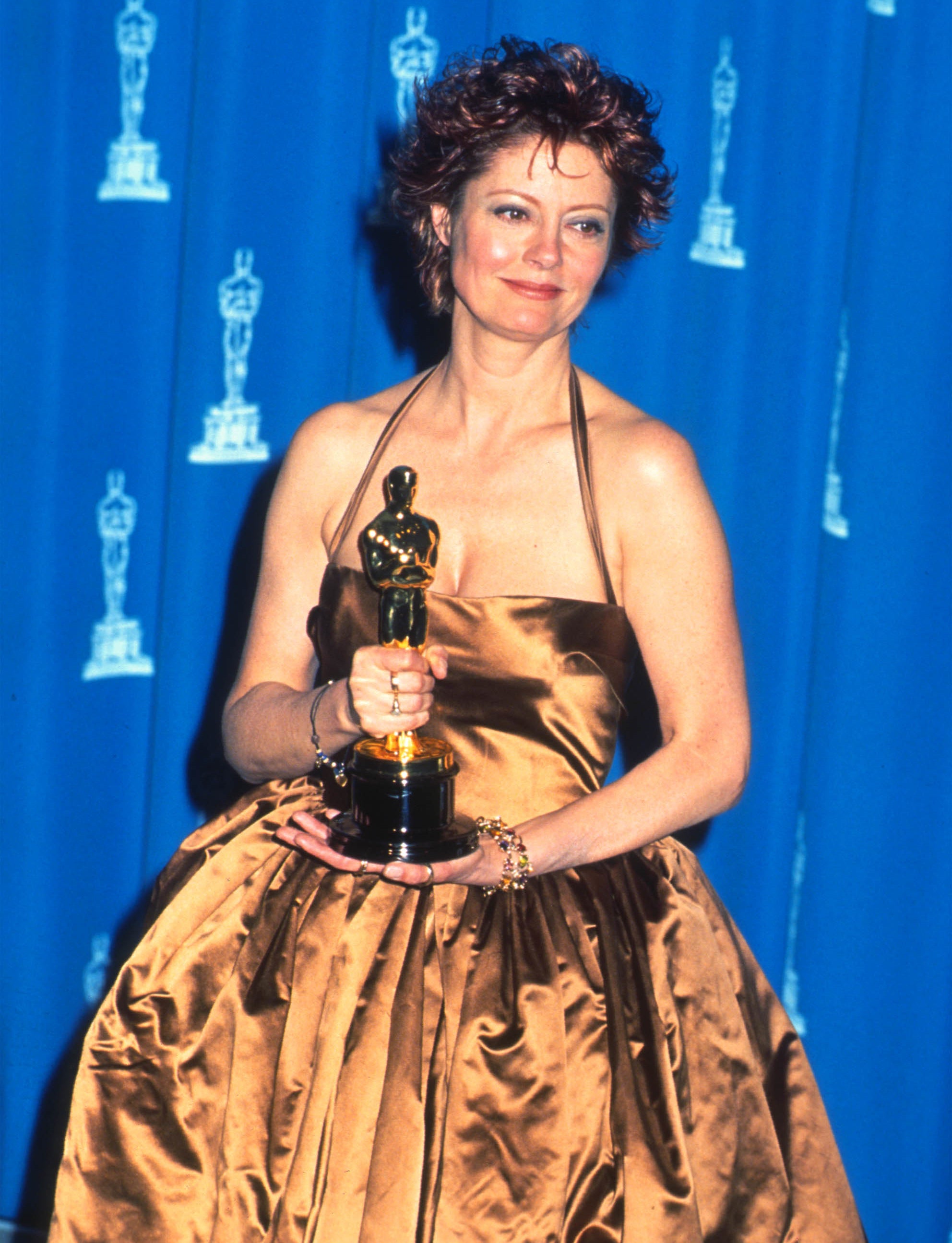 Susan Sarandon receives an Oscar at the 1996 Academy Awards