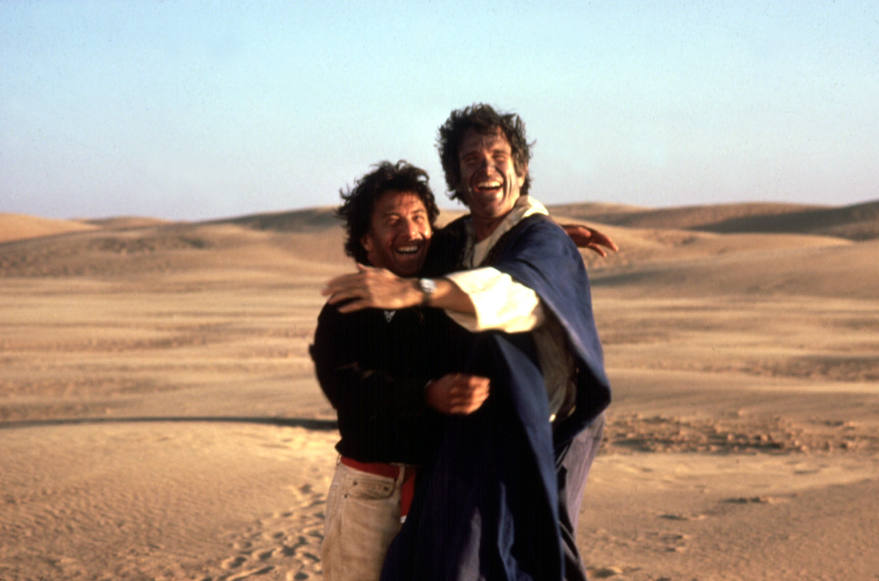 Dustin Hoffman and Warren Beatty hugging in the desert in &quot;Ishtar&quot;