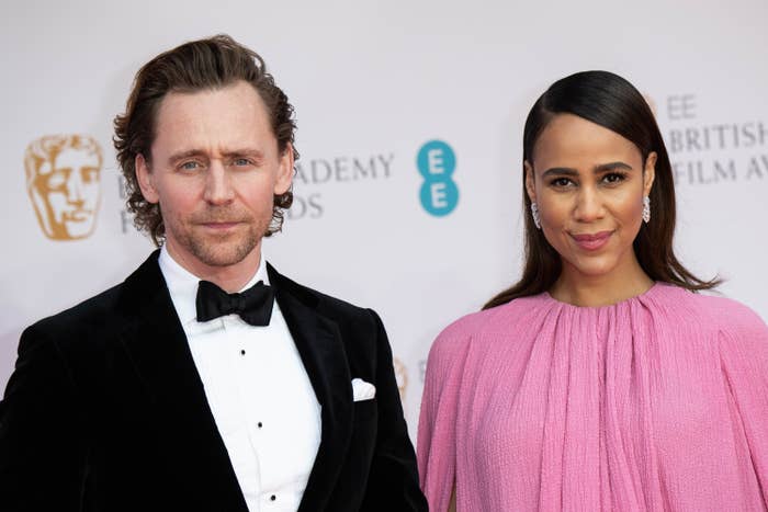 Tom and Zawe posing for photographers on the BAFTAs red carpet