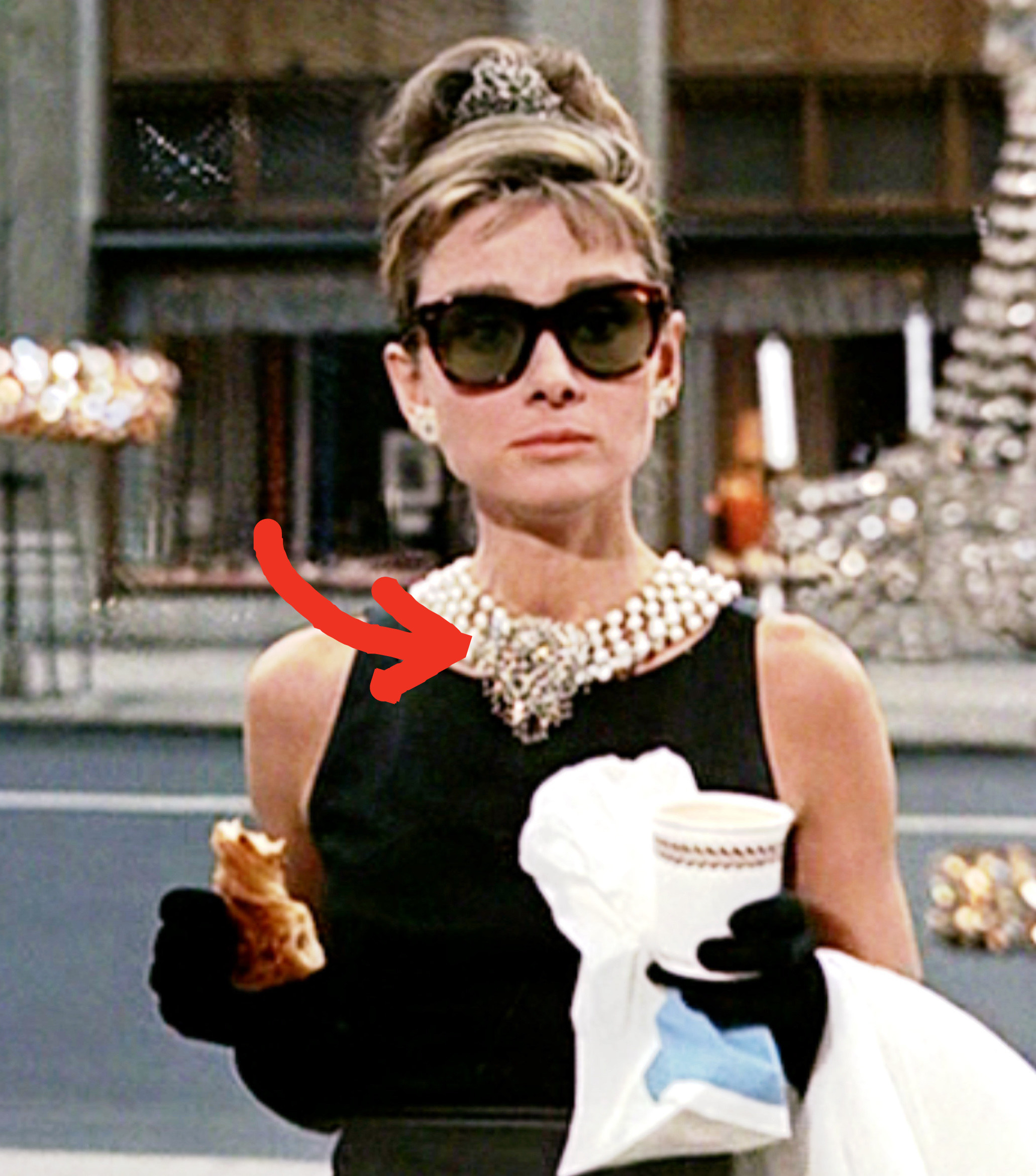 Audrey Hepburn wearing the yellow diamond necklace in &quot;Breakfast at Tiffany&#x27;s&quot;