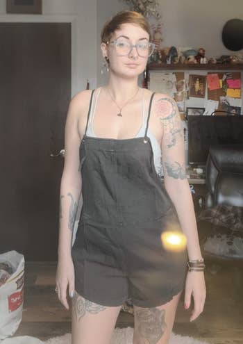 reviewer wearing overalls