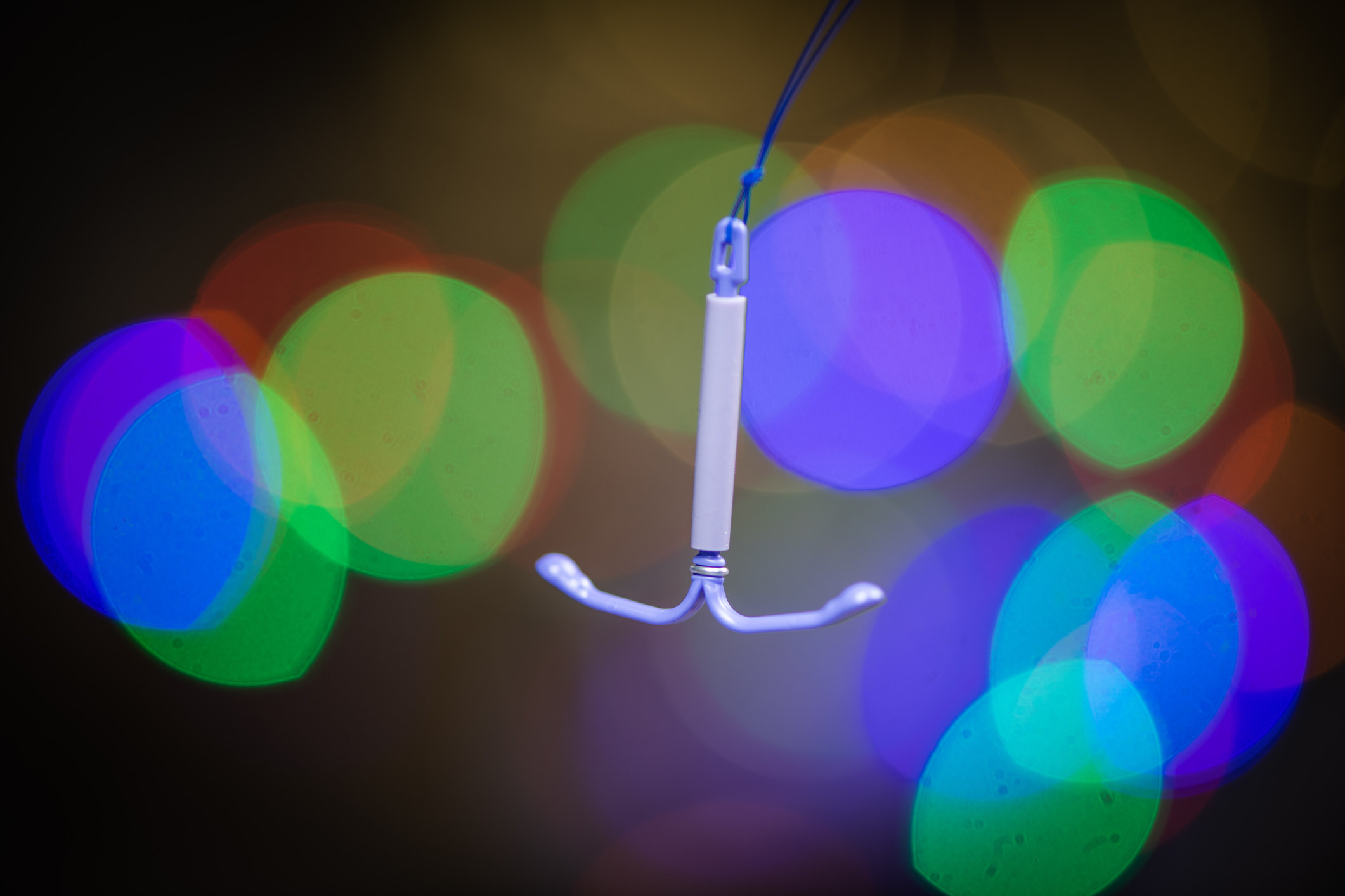 A stock image of an IUD