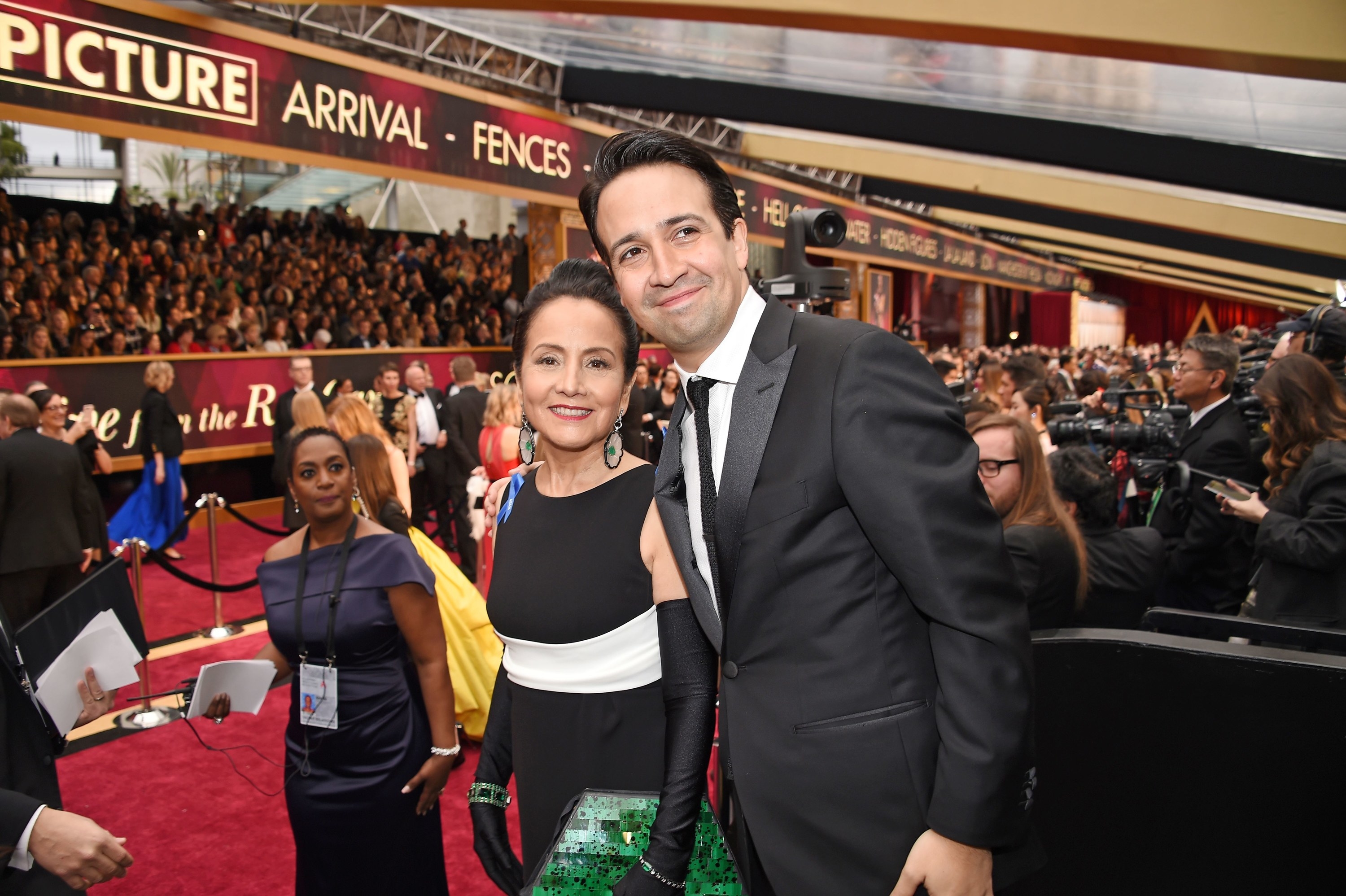 Lin-Manuel Miranda (R) and his mother Luz Towns-Miranda (L) attend the 89th Annual Academy Awards at Hollywood &amp;amp; Highland Center on February 26, 2017