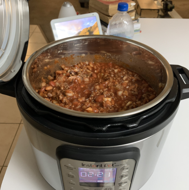 a reviewer photo of the instant pot with chili inside