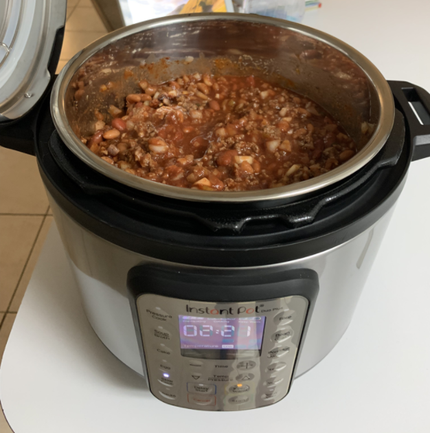 a reviewer photo of the instant pot with chili inside